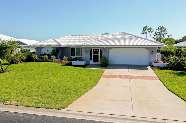 ranch-style house with a garage and a front yard