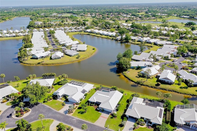 drone / aerial view with a water view