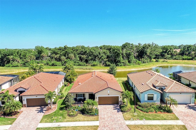 bird's eye view with a water view