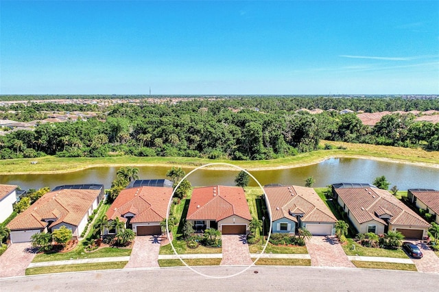 drone / aerial view featuring a water view