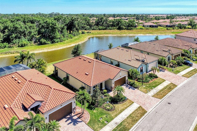 bird's eye view with a water view