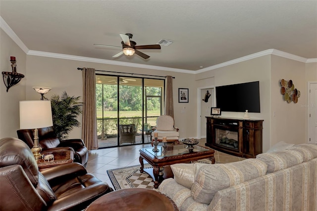 tiled living room with ornamental molding and ceiling fan