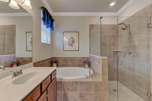 bathroom with ornamental molding, separate shower and tub, and large vanity