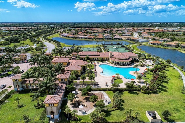 birds eye view of property featuring a water view