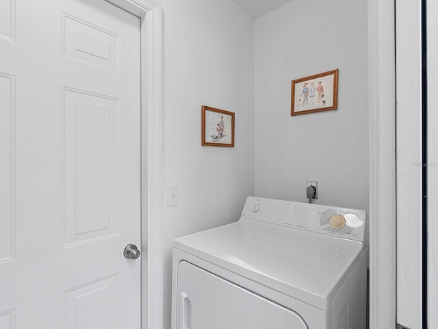 washroom with washer / clothes dryer