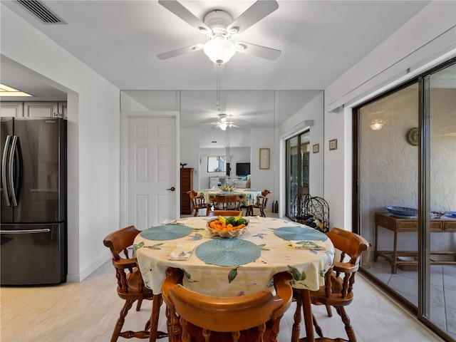 dining space with ceiling fan