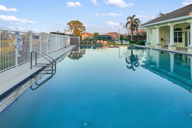 view of swimming pool with a patio area