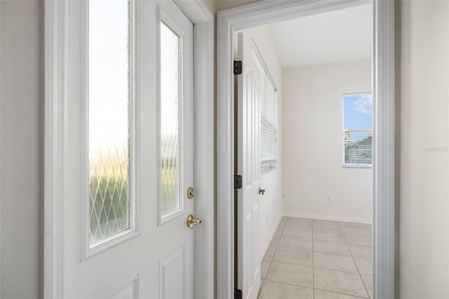 entryway featuring light tile patterned floors