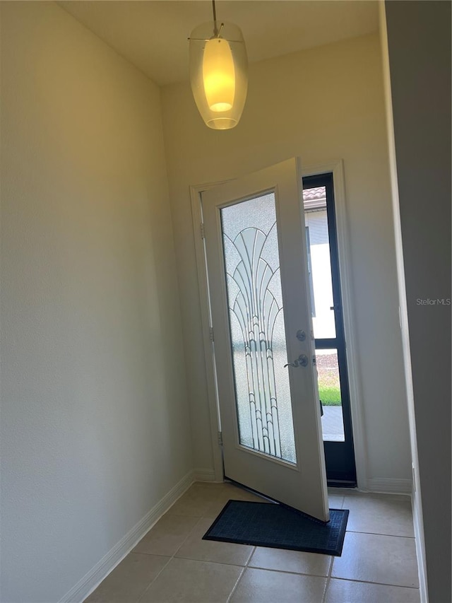 entryway with tile floors