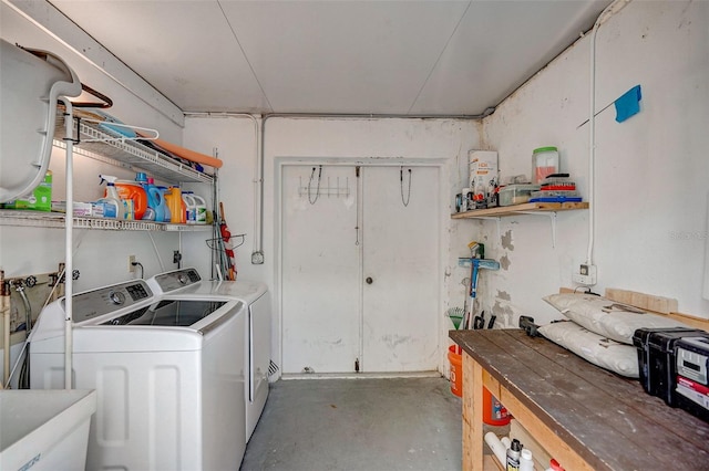 laundry area featuring sink and washing machine and clothes dryer