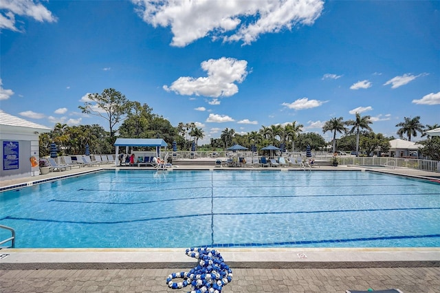 view of swimming pool with a patio