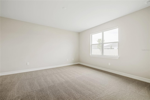 empty room with carpet floors