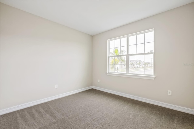 view of carpeted spare room