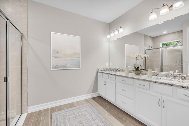 bathroom featuring vanity and walk in shower