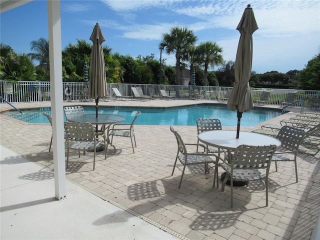 view of swimming pool featuring a patio