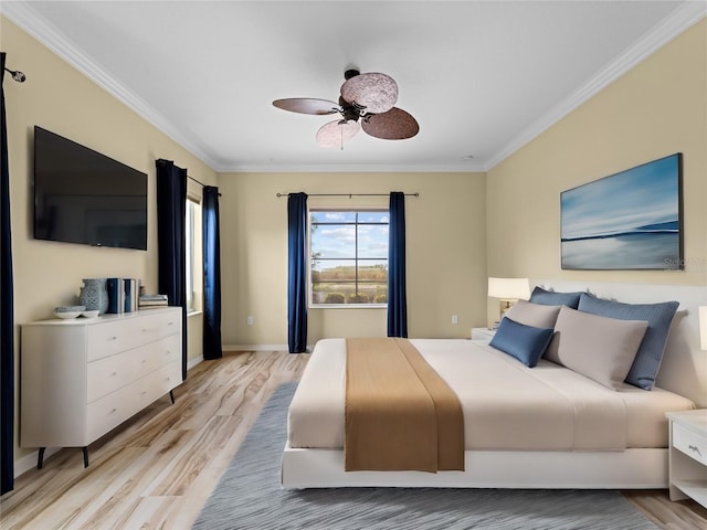 bedroom with ceiling fan, light hardwood / wood-style flooring, and ornamental molding