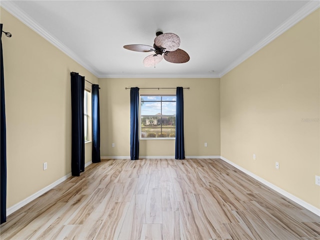 spare room featuring light hardwood / wood-style floors, ceiling fan, and ornamental molding