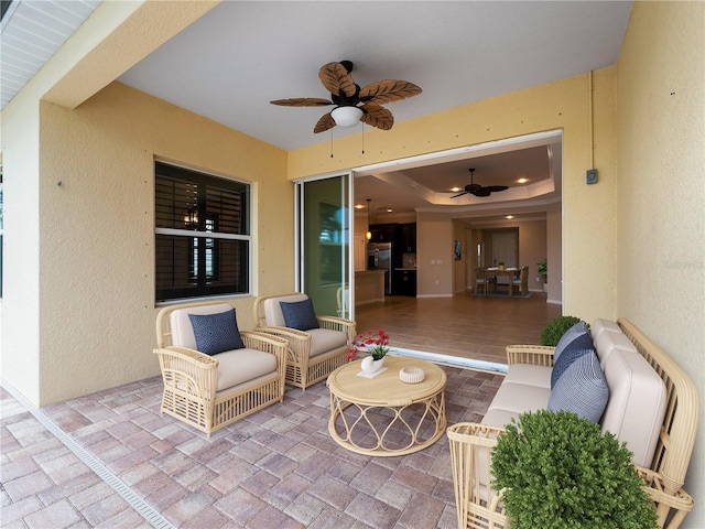 view of patio / terrace with ceiling fan