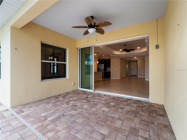 view of patio with ceiling fan