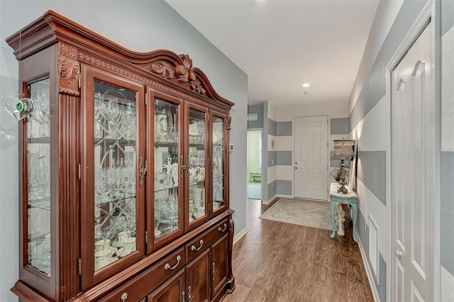 hall featuring hardwood / wood-style floors