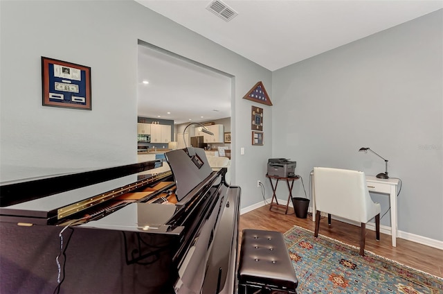 interior space with hardwood / wood-style floors