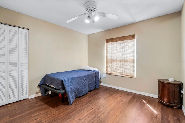 bedroom featuring a closet, ceiling fan, and hardwood / wood-style flooring