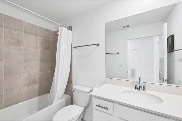 full bathroom featuring vanity, toilet, and shower / bath combo with shower curtain