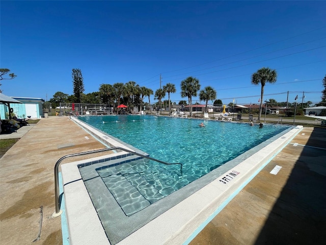 view of pool featuring a patio