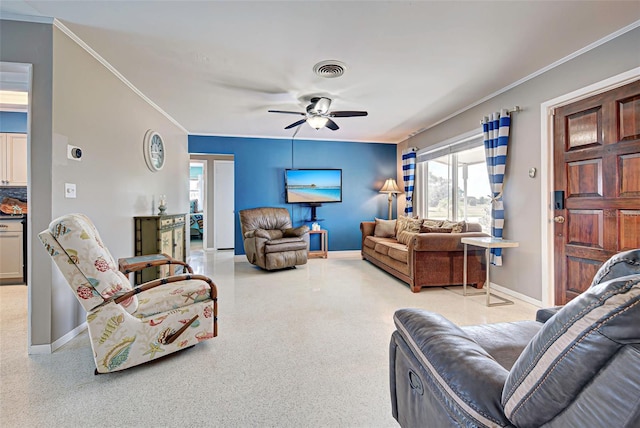 living room with ceiling fan and crown molding