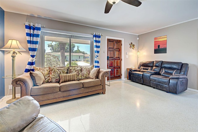 living room featuring ceiling fan and ornamental molding