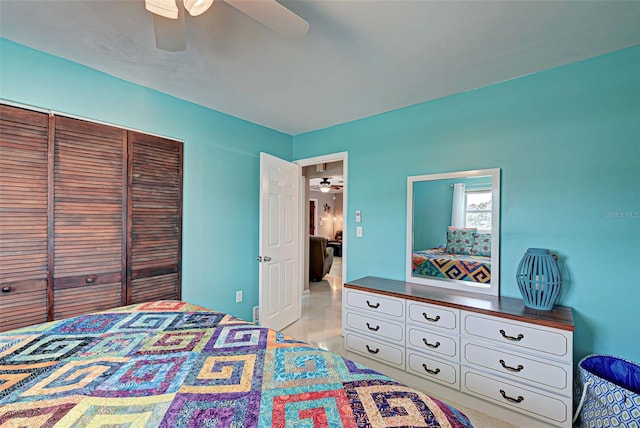 bedroom featuring ceiling fan and a closet