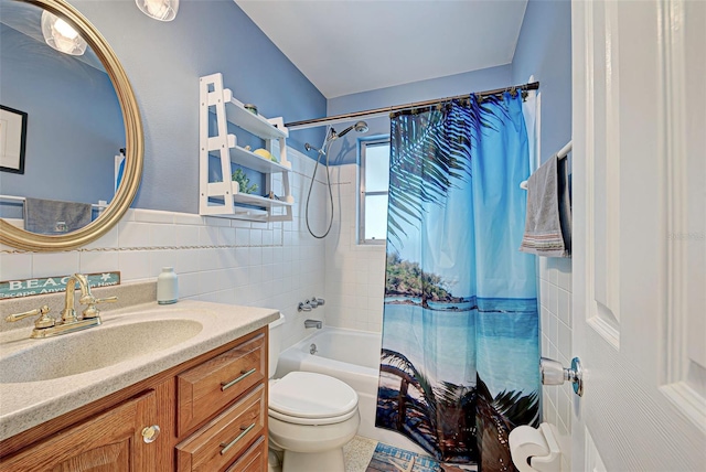 full bathroom with vanity, tile patterned floors, toilet, shower / bathtub combination with curtain, and tile walls