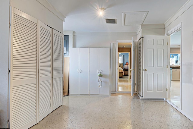 hallway with crown molding