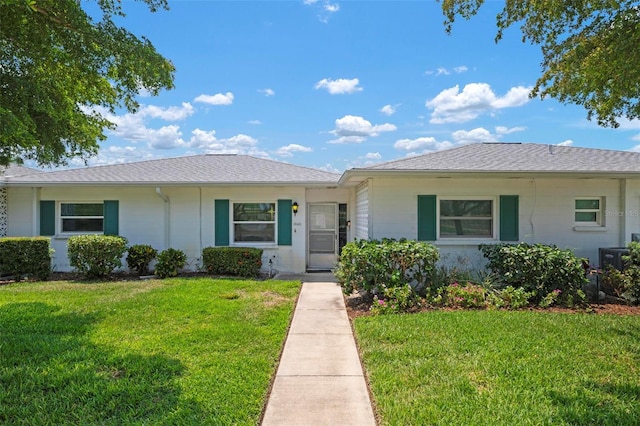 single story home with a front yard