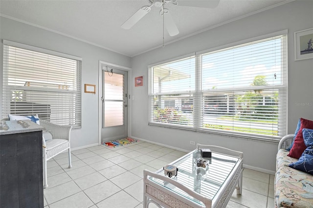 tiled living room featuring ceiling fan and crown molding