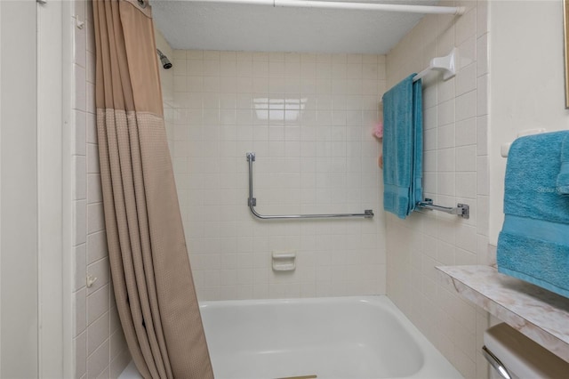 bathroom featuring shower / bathtub combination with curtain