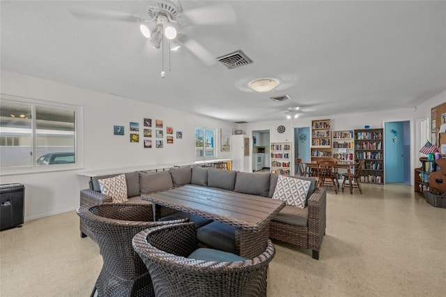 living room with a textured ceiling