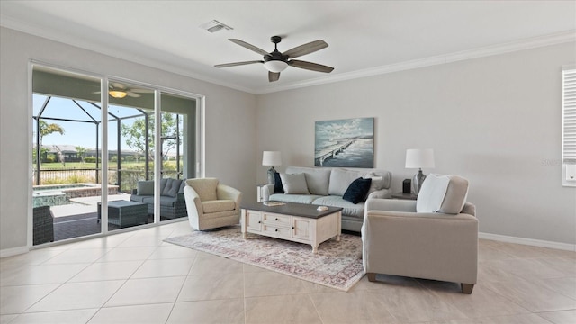 tiled living room featuring ceiling fan and crown molding