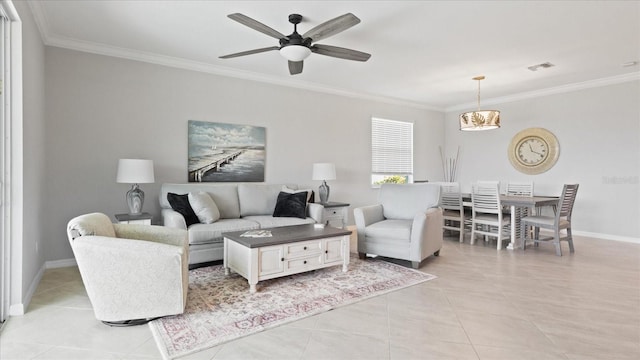 tiled living room featuring ornamental molding and ceiling fan with notable chandelier