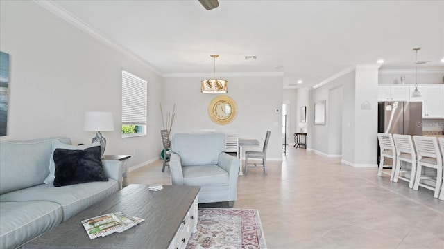 living room with light tile flooring and crown molding