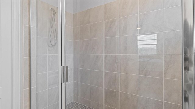 bathroom featuring an enclosed shower