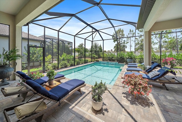 view of pool featuring a lanai and a patio area