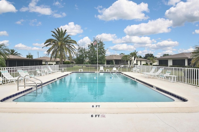 view of pool featuring a patio