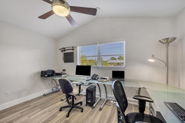 office space featuring ceiling fan, light hardwood / wood-style floors, and lofted ceiling