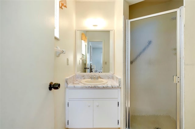 bathroom with an enclosed shower and oversized vanity