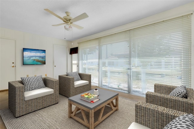 472 Circlewood Dr Unit L9, Venice, FL 34293 - living room with a ceiling fan