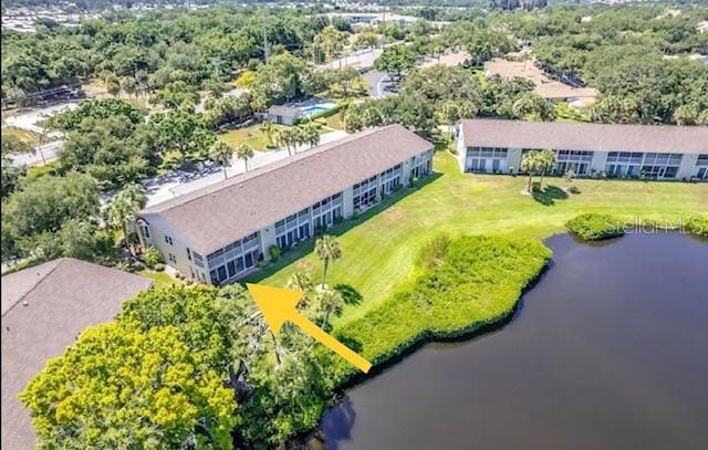 drone / aerial view with a water view