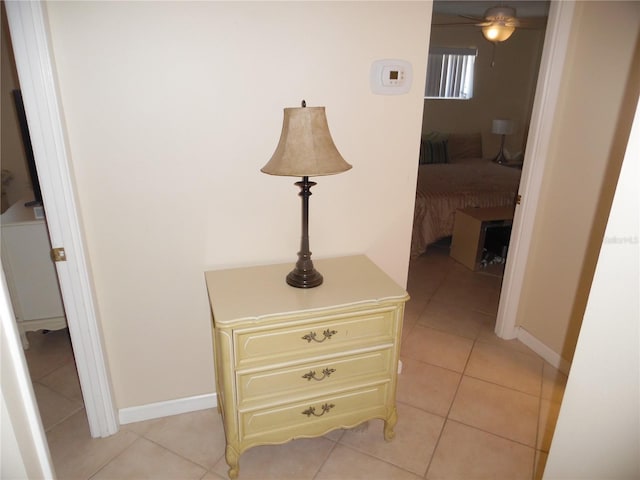 hallway with light tile patterned flooring