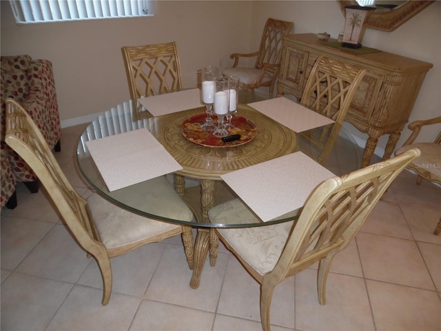 dining room featuring light tile patterned floors