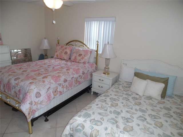 bedroom with light tile patterned floors and ceiling fan